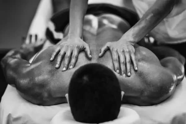 Deep tissue massage being performed on a client’s back