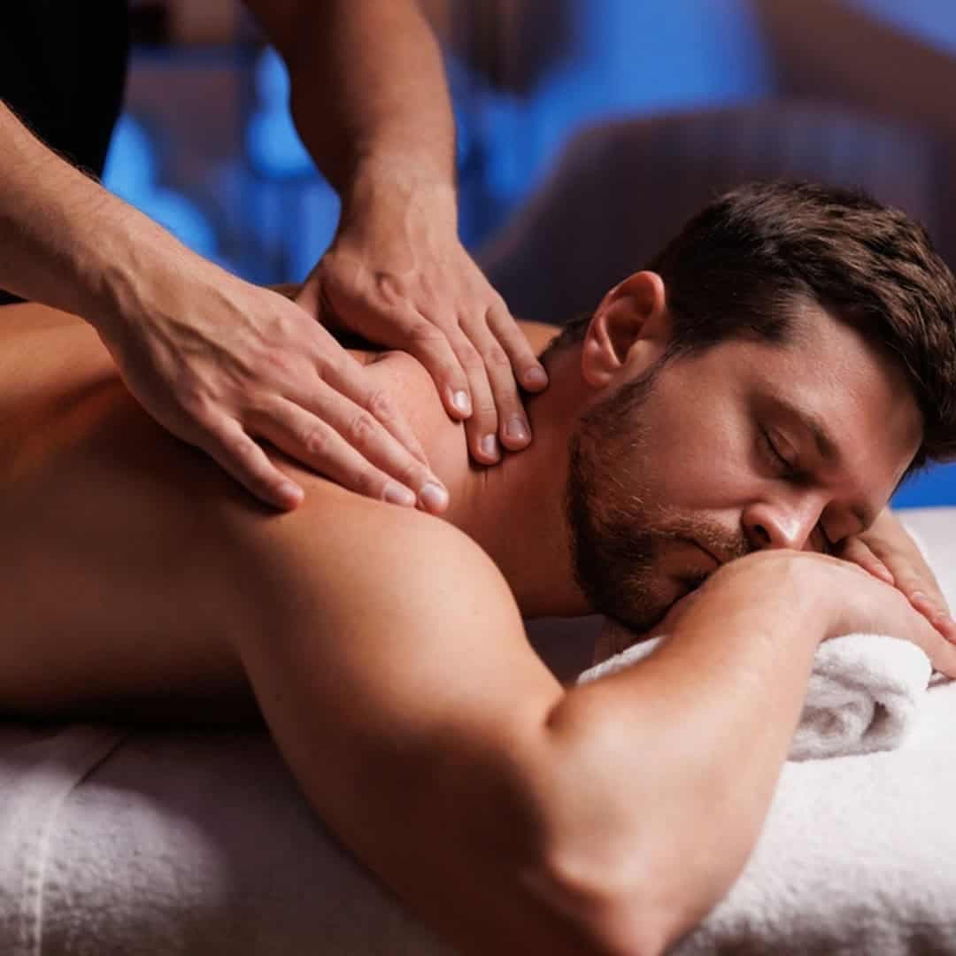 Hands performing therapeutic massage technique
